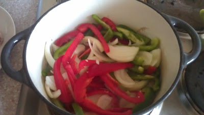 Peppers and Onions added to the chicken 