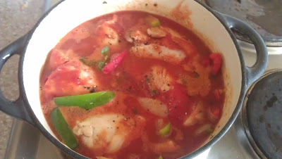 Tomatoes added to the chicken, peppers and onions