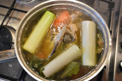 Boiling the stock, carcass and vegetables