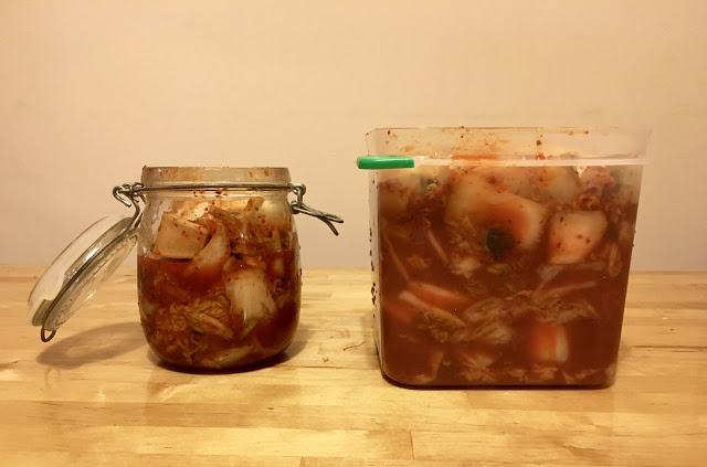 homemade kimchi in two jars