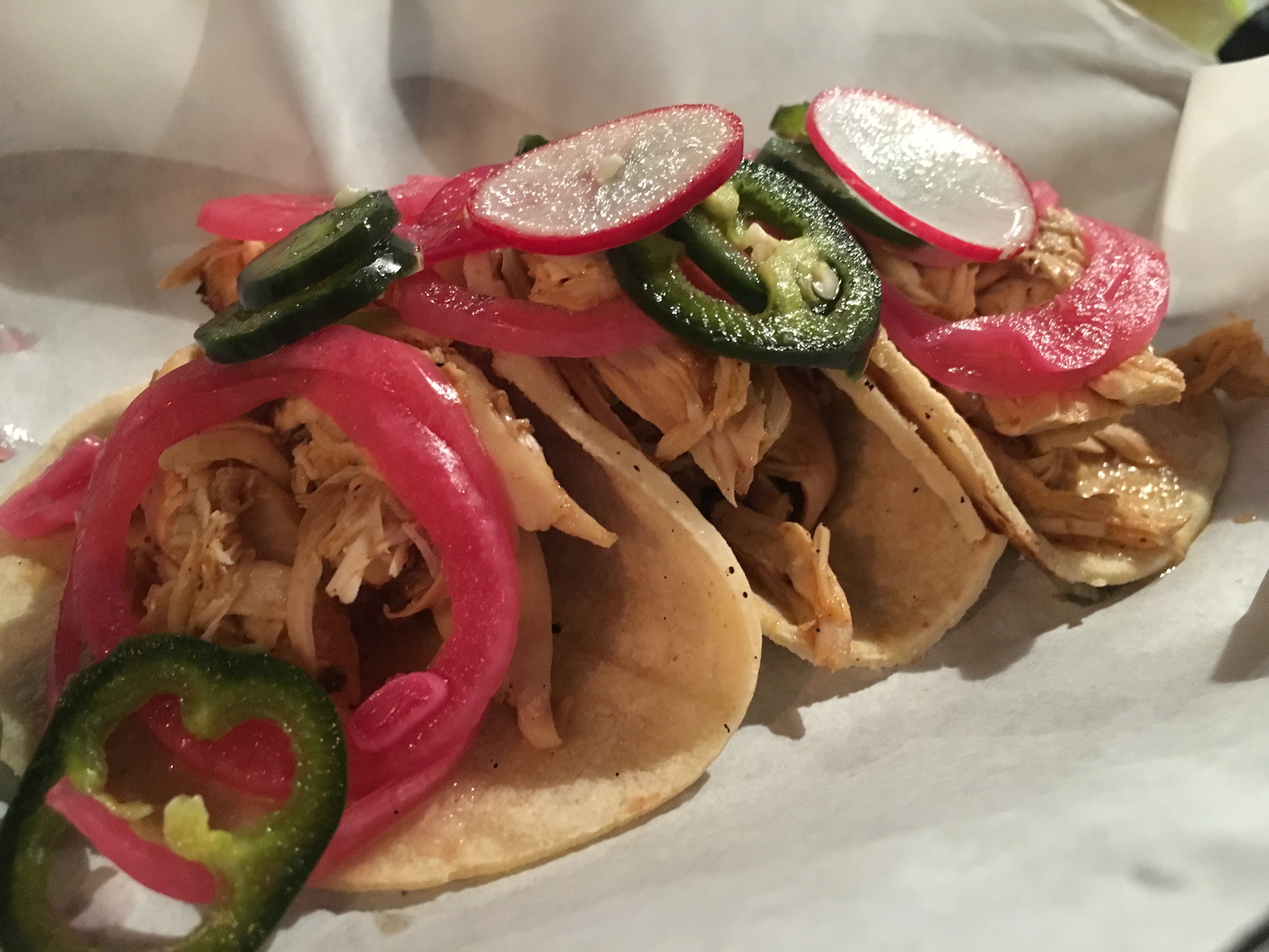 Chicken pibil with radish and pink pickled onions 