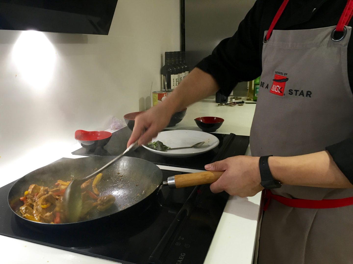 Stir frying at the school of wok!