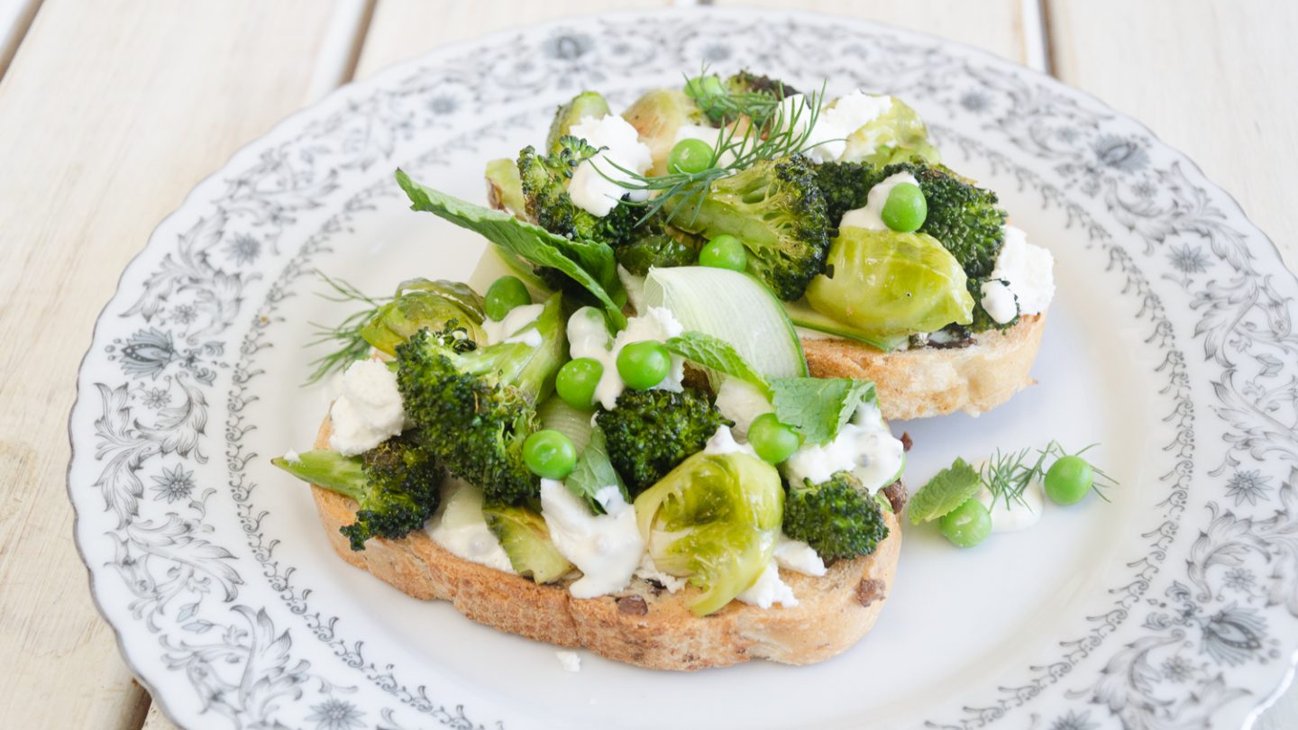 Roasted greens and goats cheese on toast