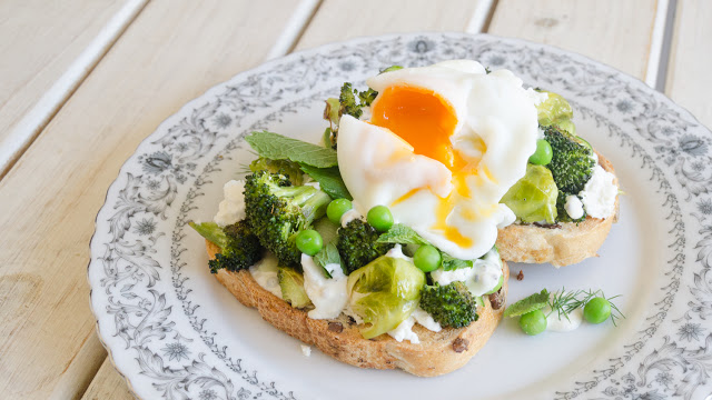 Roasted Greens and goats cheese on toast with a poached egg